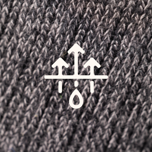 Shinesty's three-arrow wicking icon on charcoal marled quarter sock knit, every loop of yarn visible