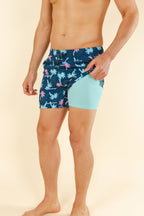 The Shorebreak | Navy Tropical Ball Hammock® Pouch 8" Swim Trunks - Shinesty