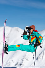 The Side Country Sender | Turquoise Striped Retro Women's One Piece Ski Suit - Shinesty